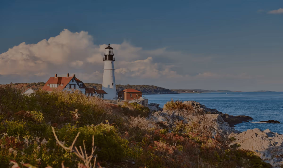 Coastal view of the historic Portland Head Light lighthouse in Cape Elizabeth, Maine