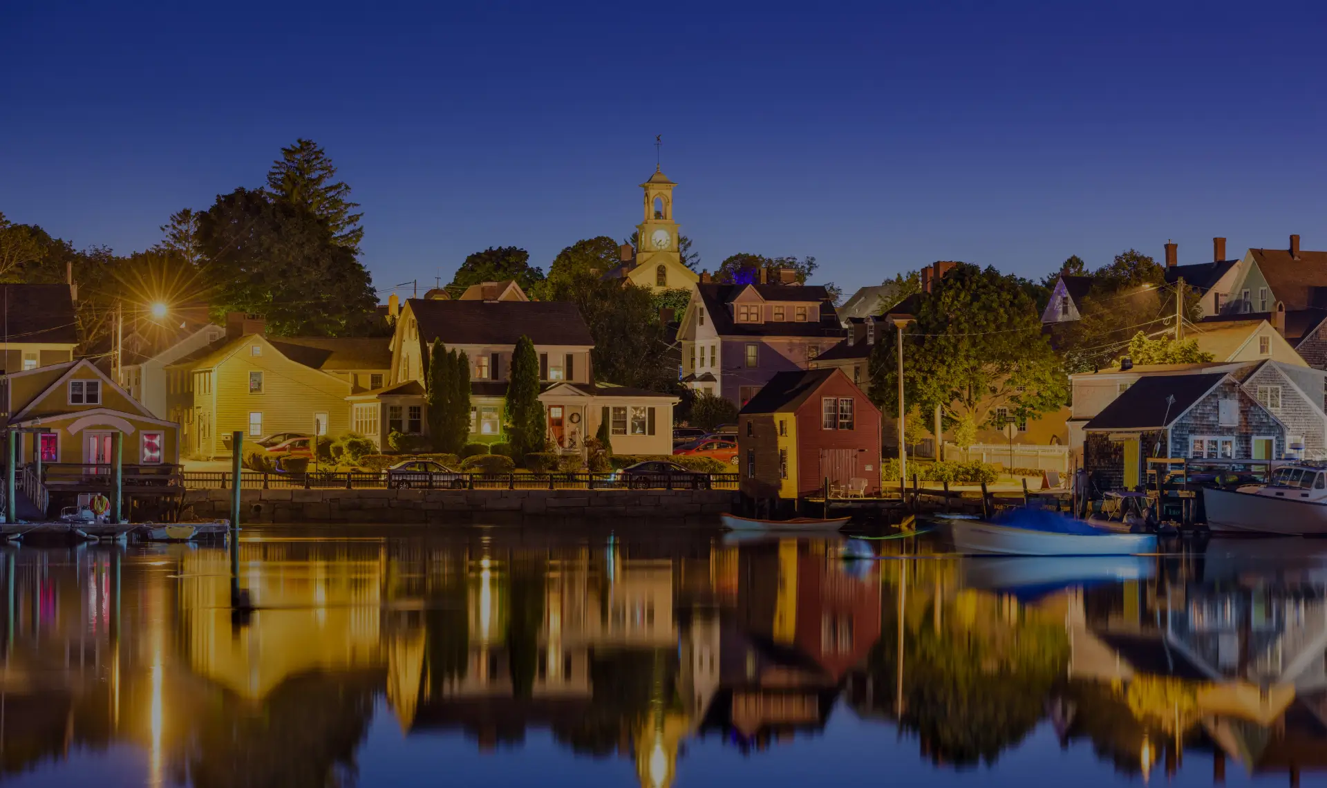Historic brick buildings and waterfront dining at sunset in downtown Portsmouth, New Hampshire