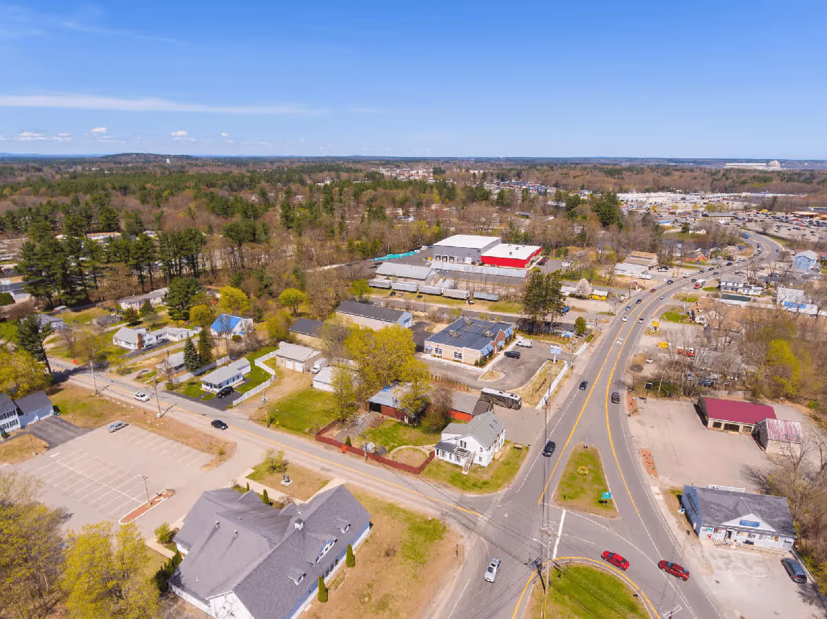 Aerial drone view of beachfront homes and the sandy coastline in Seabrook, New Hampshire